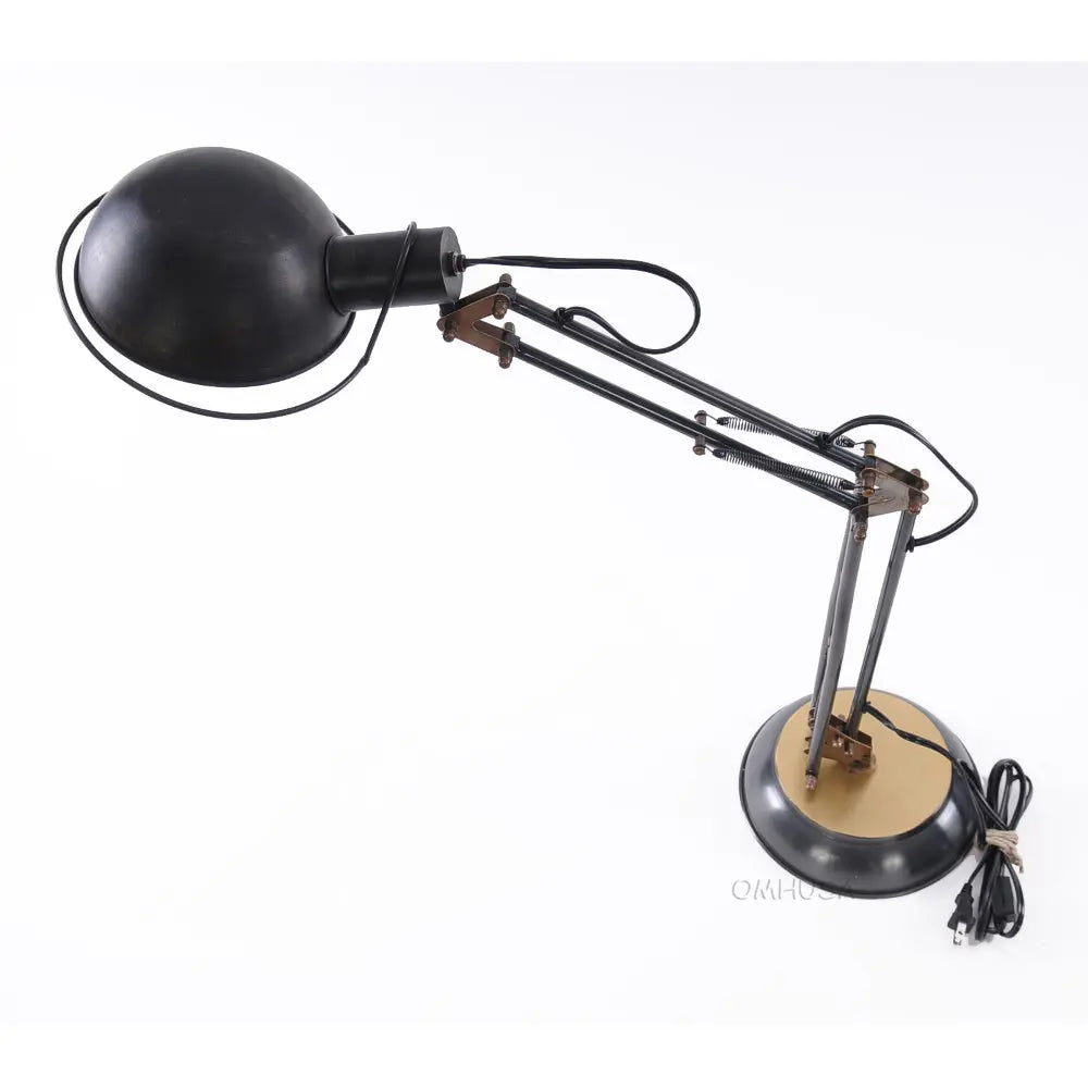 Lampe de table à ressort en laiton sur socle rond
