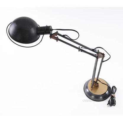 Lampe de table à ressort en laiton sur socle rond