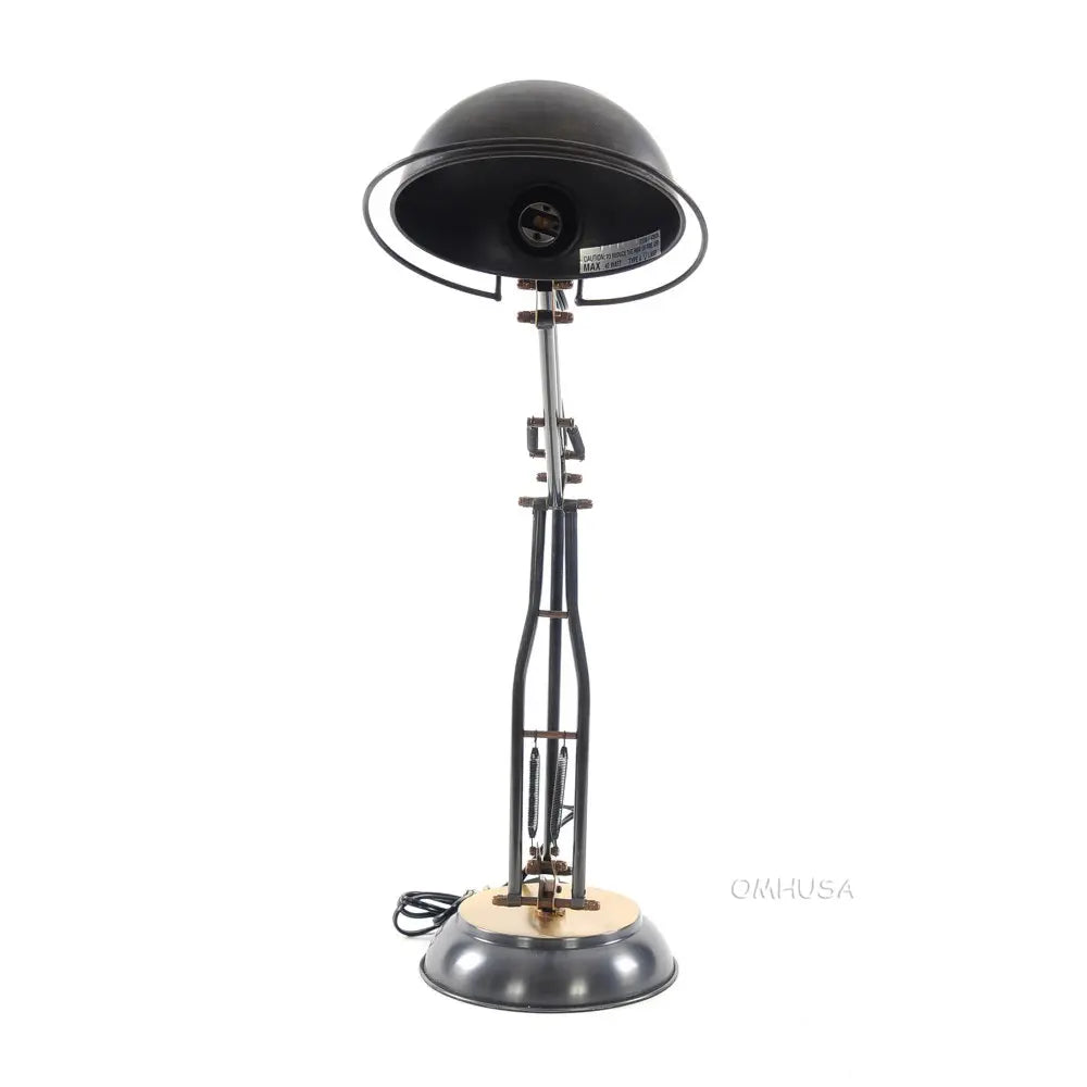 Lampe de table à ressort en laiton sur socle rond