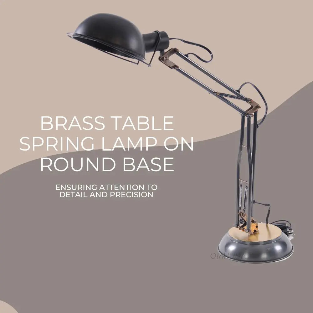 Lampe de table à ressort en laiton sur socle rond
