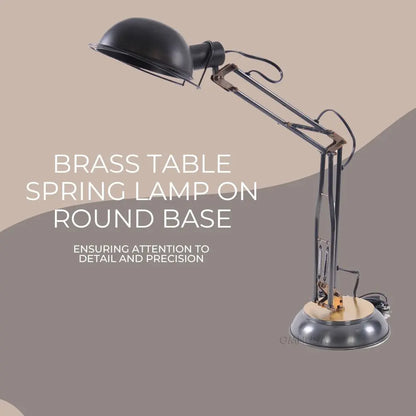 Lampe de table à ressort en laiton sur socle rond