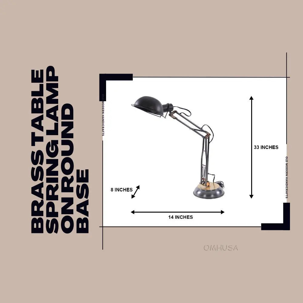 Lampe de table à ressort en laiton sur socle rond