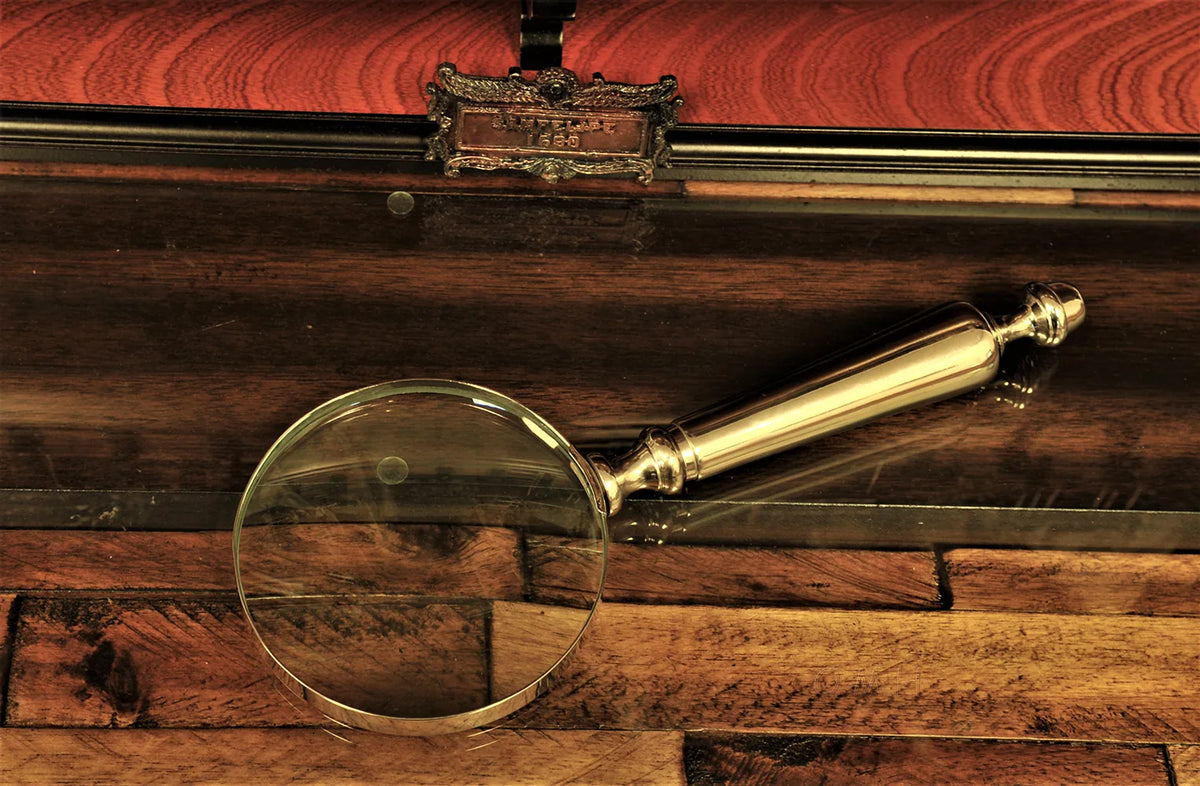Lot de 4 : Loupe, ouvre-lettres, décapsuleur et éteignoir