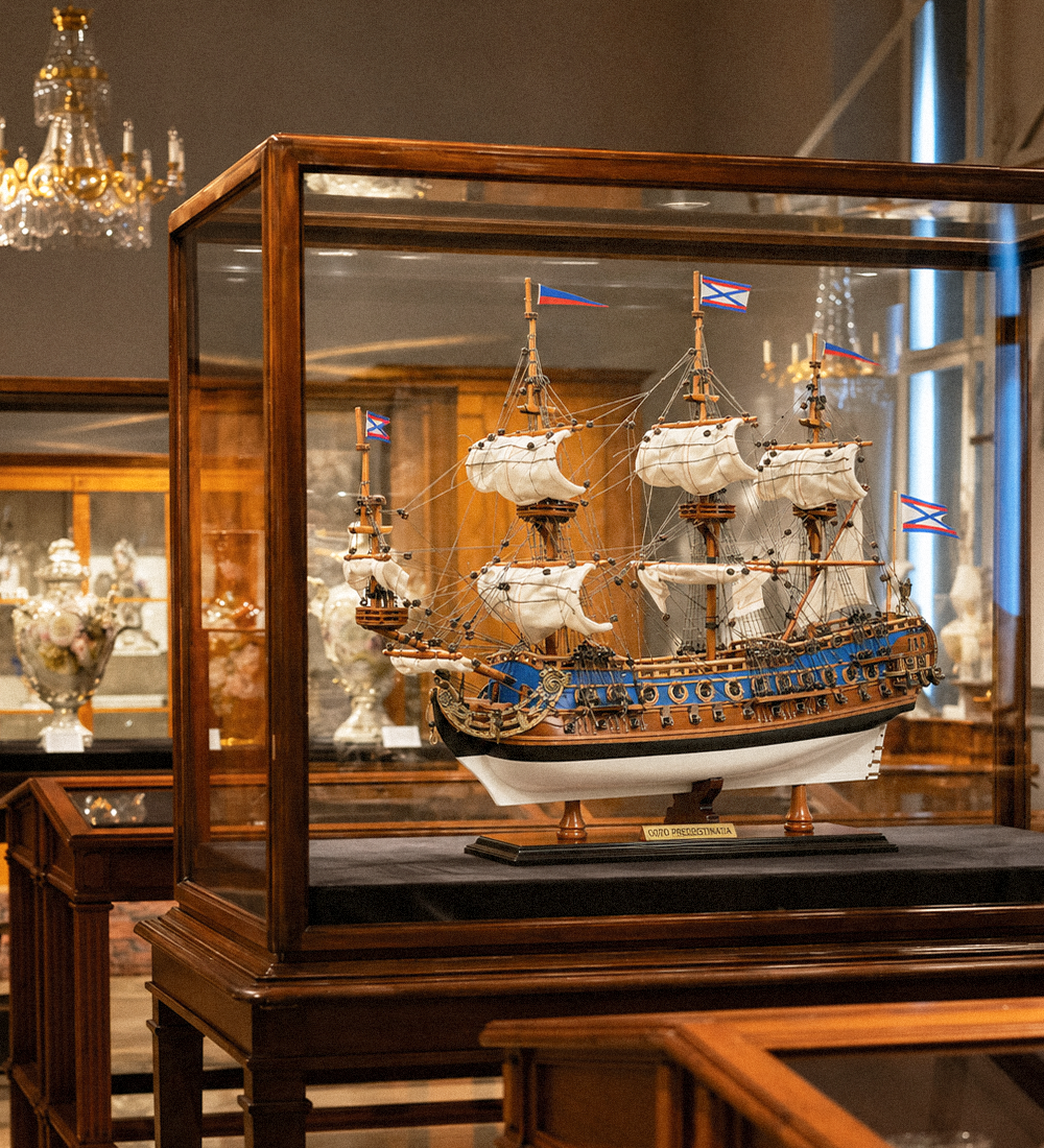 Handcrafted wooden ship model with intricate maritime details